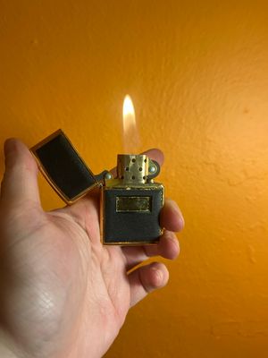 1997 Gold &amp; Black Zippo Lighter