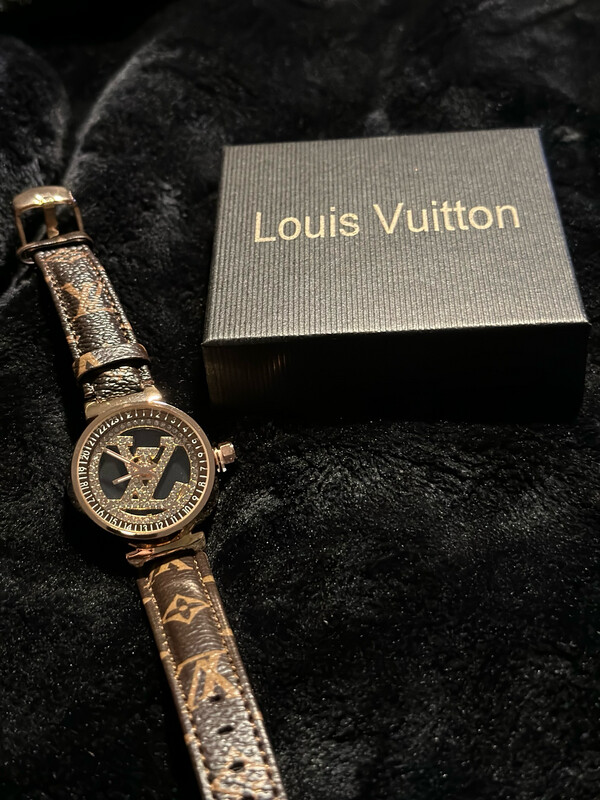 LV Rotating Logo Watch