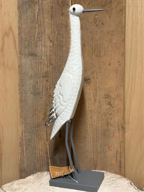 Metelaen vogel beeld binnen