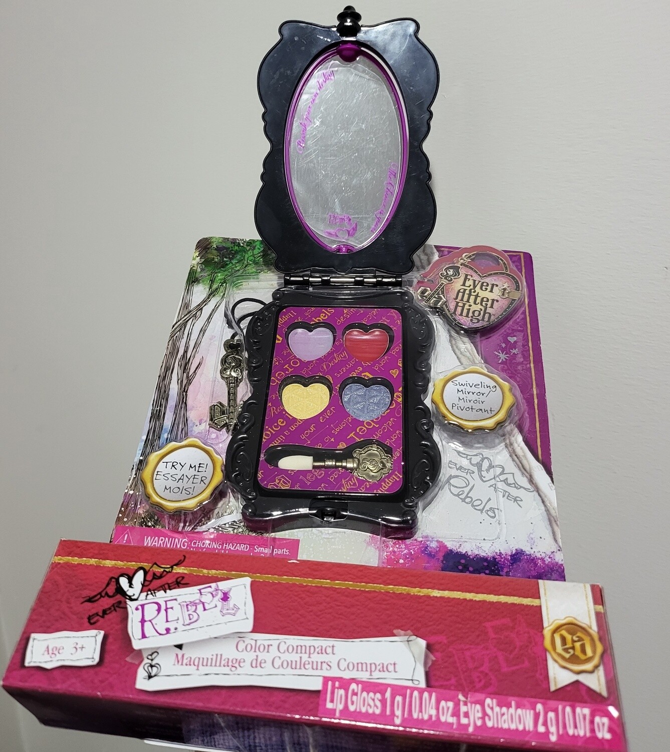 Ever After High Rebel Color Compact ( Lip Gloss, Eye Shadow, Swiveling Mirror)