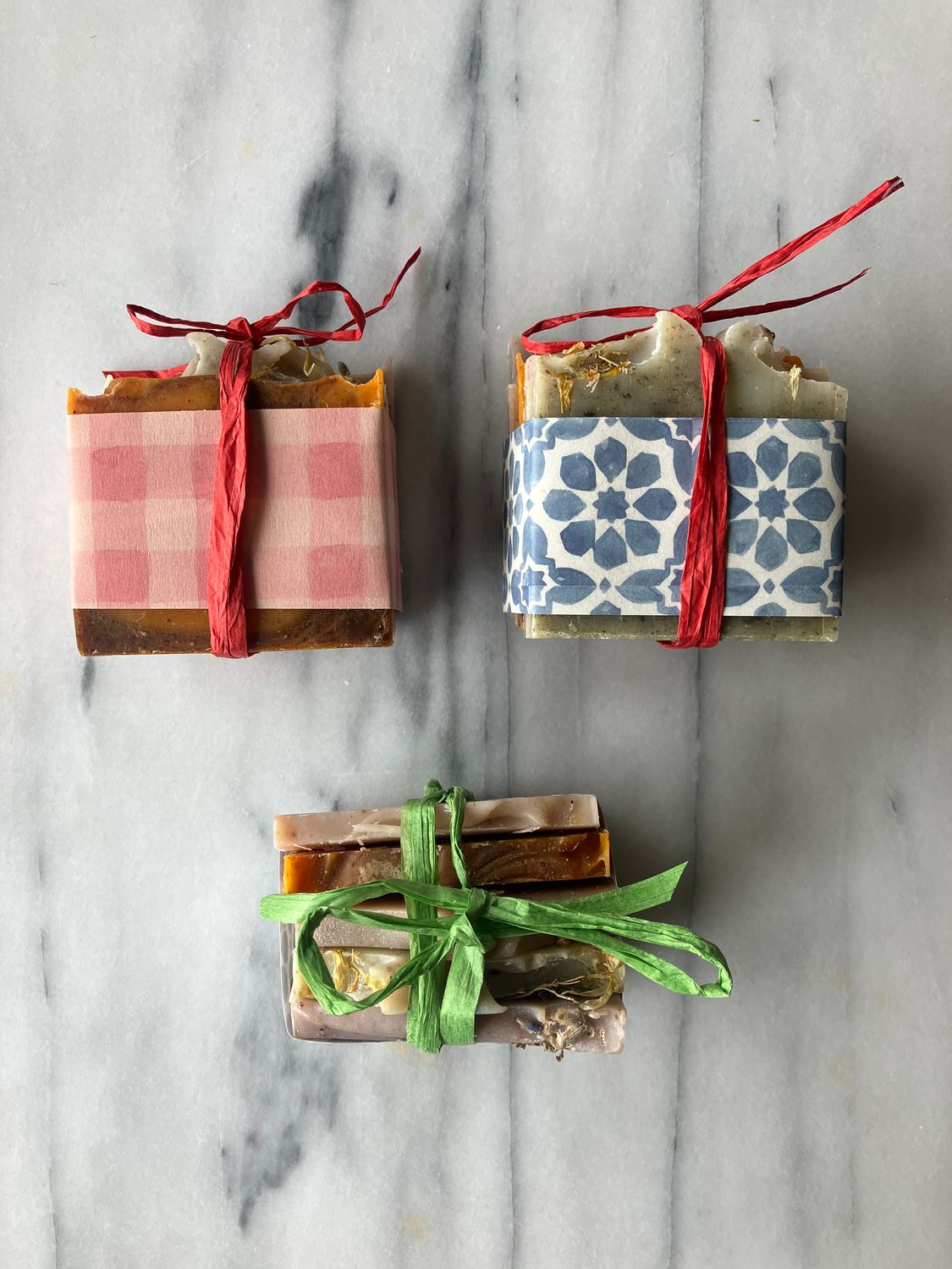 Soap ends bundle wrapped with paper and tied with raffia vegan handmade natural coloured palm oil free eco friendly