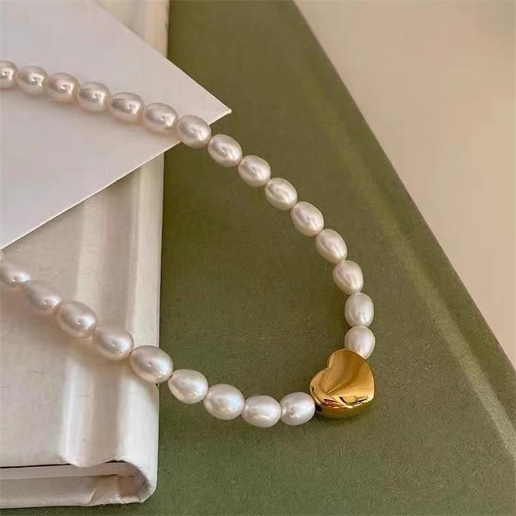 Natural Freshwater Pearl Titanium Steel Love Necklace.