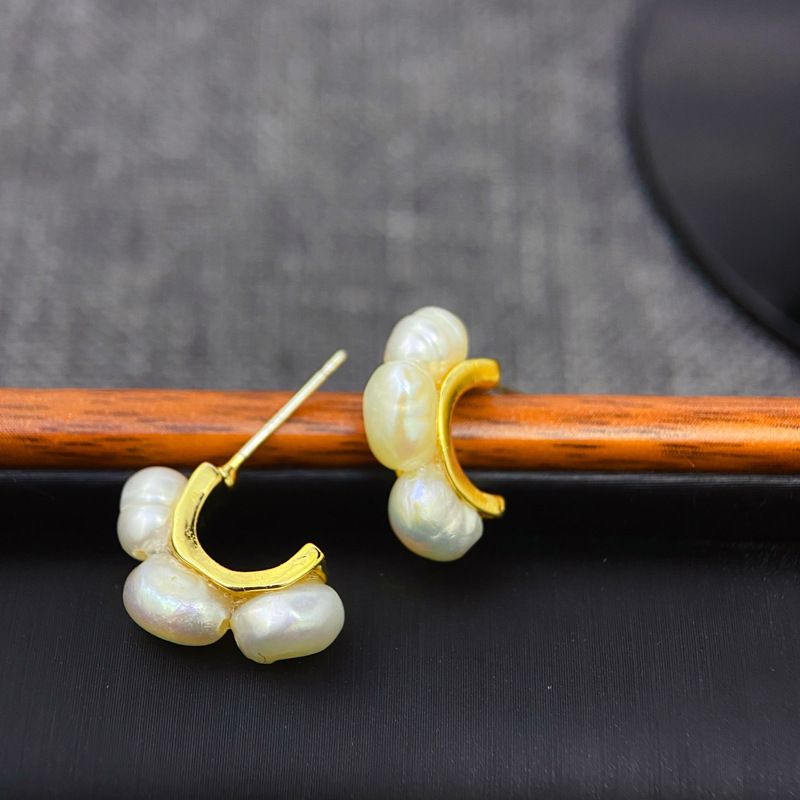 Freshwater Tri-Studded Natural Pearl Earrings. Freshwater Tri-Studded Natural Pearl Earrings.
