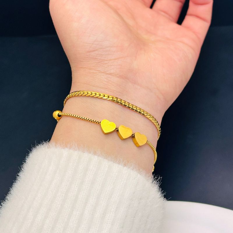 Valentines Triple Heart Bracelet in gold overlay.