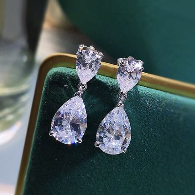 WATER DROP SIMULATED PLATINUM EARRINGS. WATER DROP SIMULATED PLATINUM EARRINGS.