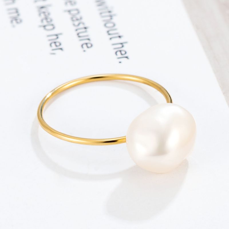 Natural Baroque Pearl Ring With Gold And Titanium Overlay
