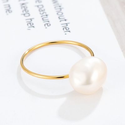 Natural Baroque Pearl Ring With Gold And Titanium Overlay