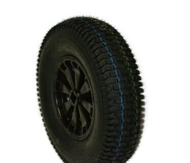 Black tire with profile and black rim, side view
