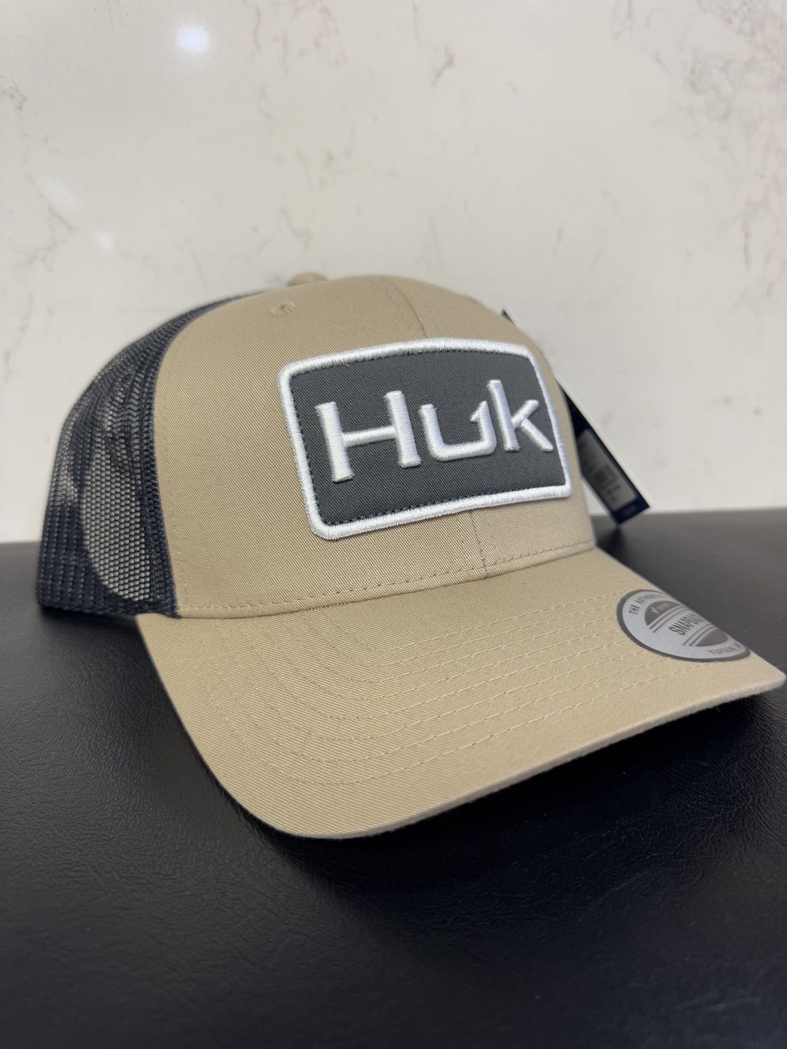 HUK Logo Trucker Braid Snapback