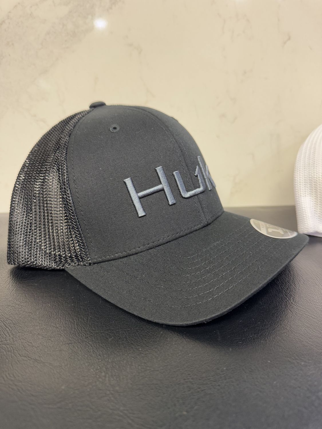 HUK Embroidered 110 Snapback Curved Black