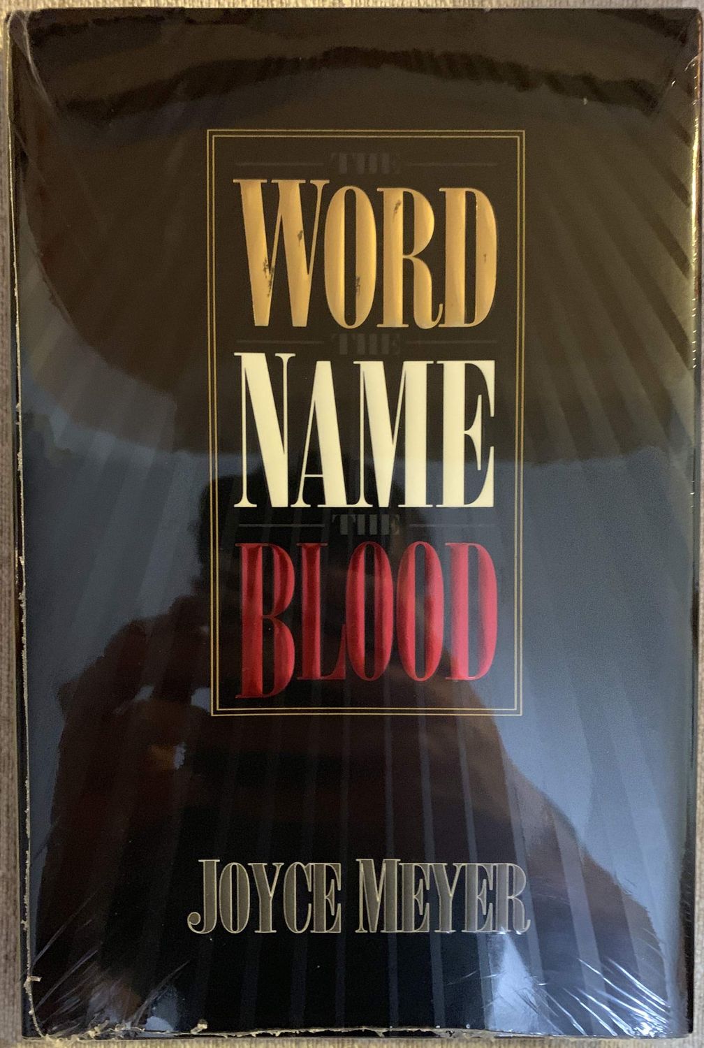 The Word, the Name, the Blood,.
