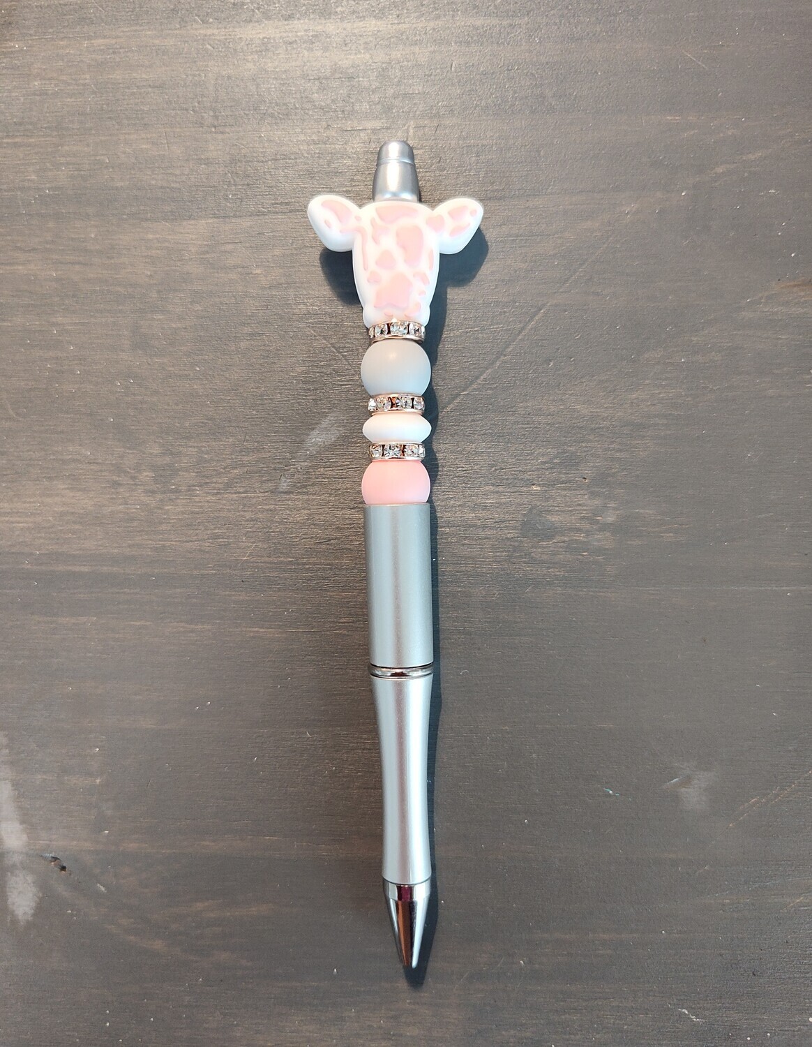 Pink/white cow