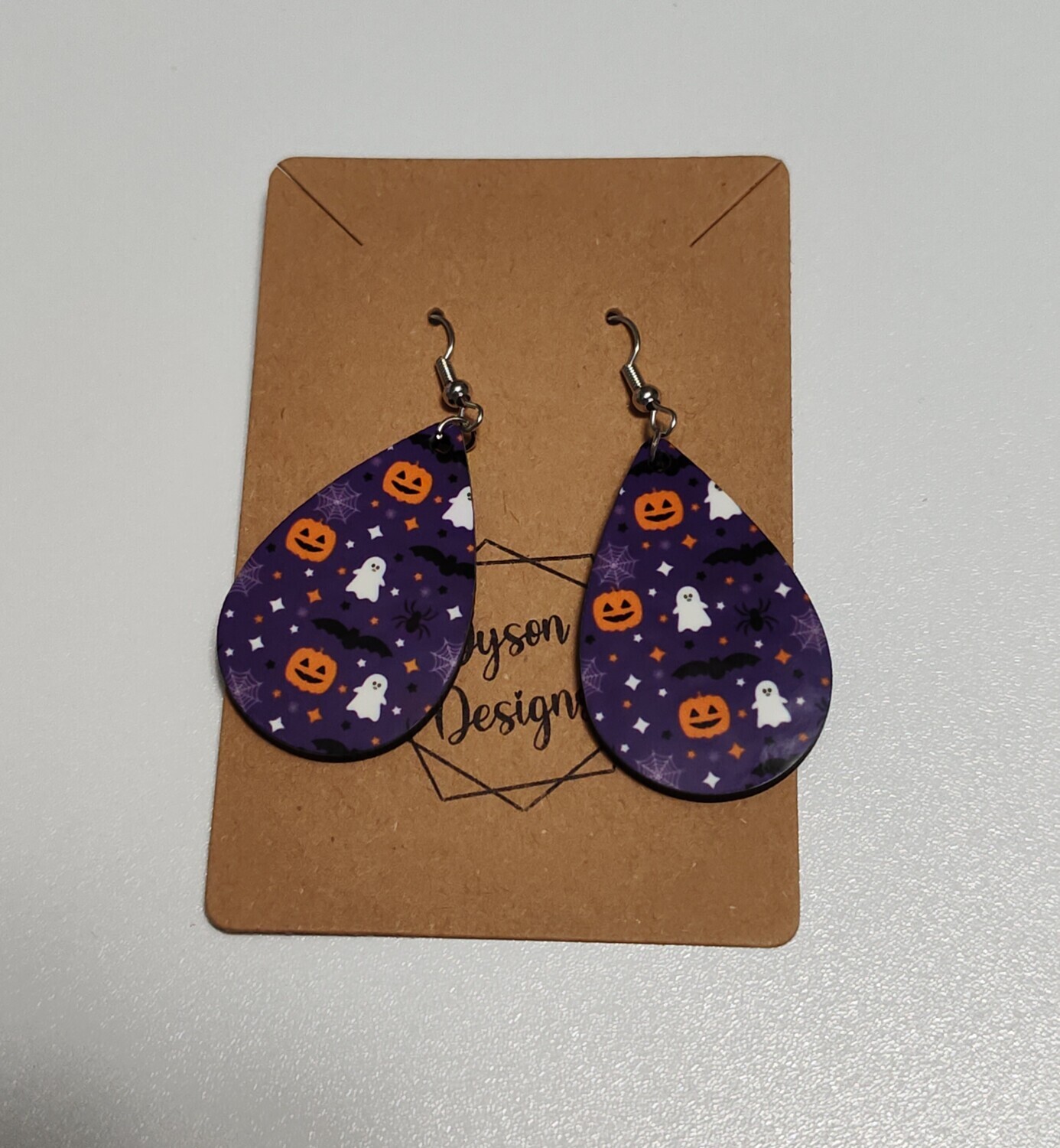 Purple background ghosts/bats/jackolanterns