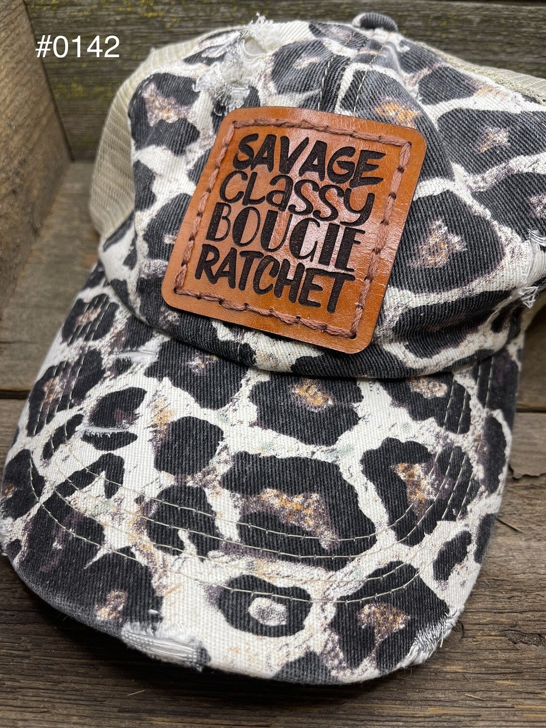 &quot;Savage, Classy, Bougie, Ratchet&quot; Criss-
Cross Cap