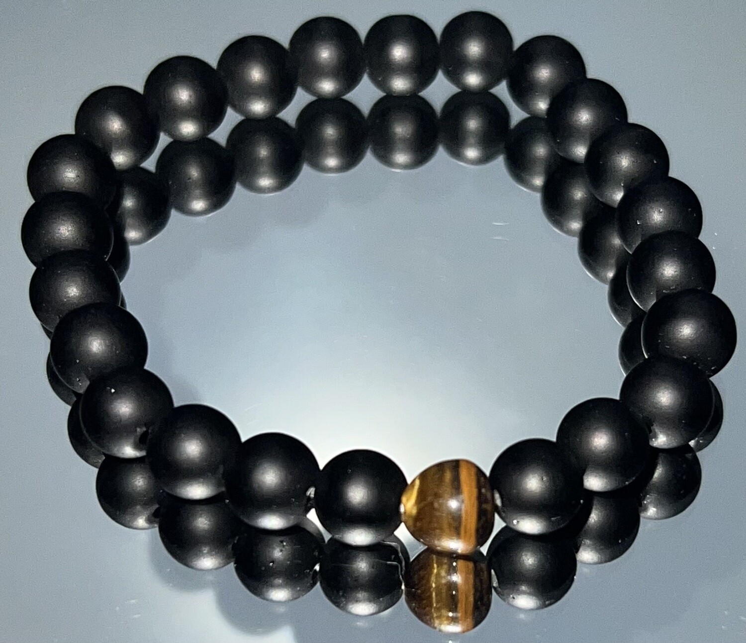 Black beaded bracelet with tiger eye detailing