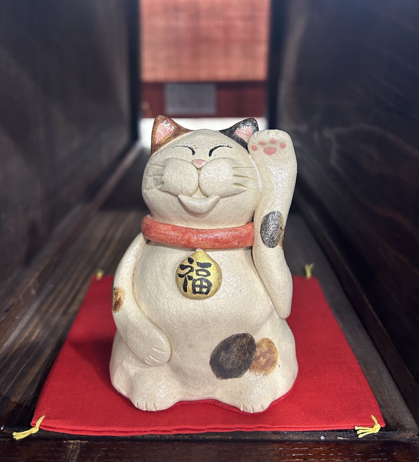 Handcrafted Ceramic Maneki-neko (Lucky Cat) with Red Cushion A