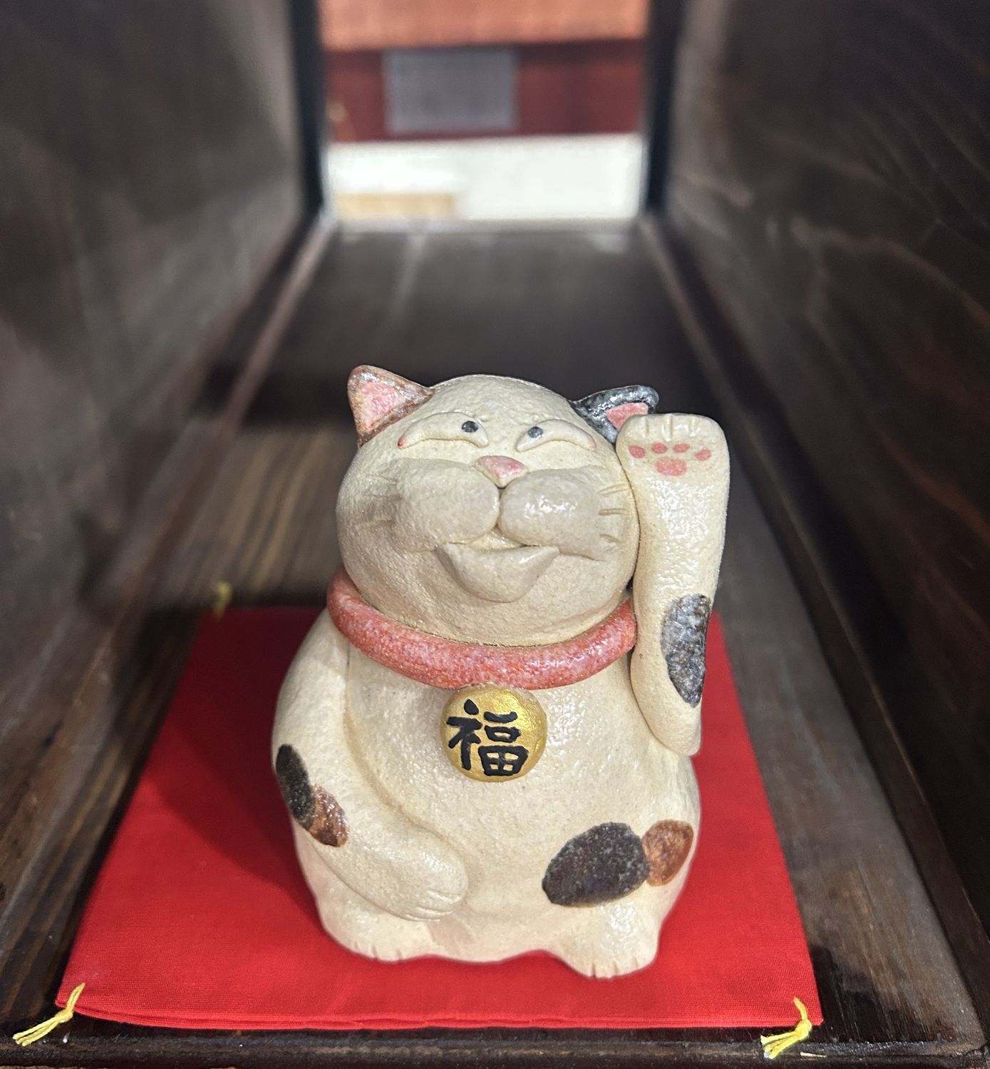 Handcrafted Ceramic Maneki-neko (Lucky Cat) with Red Cushion B