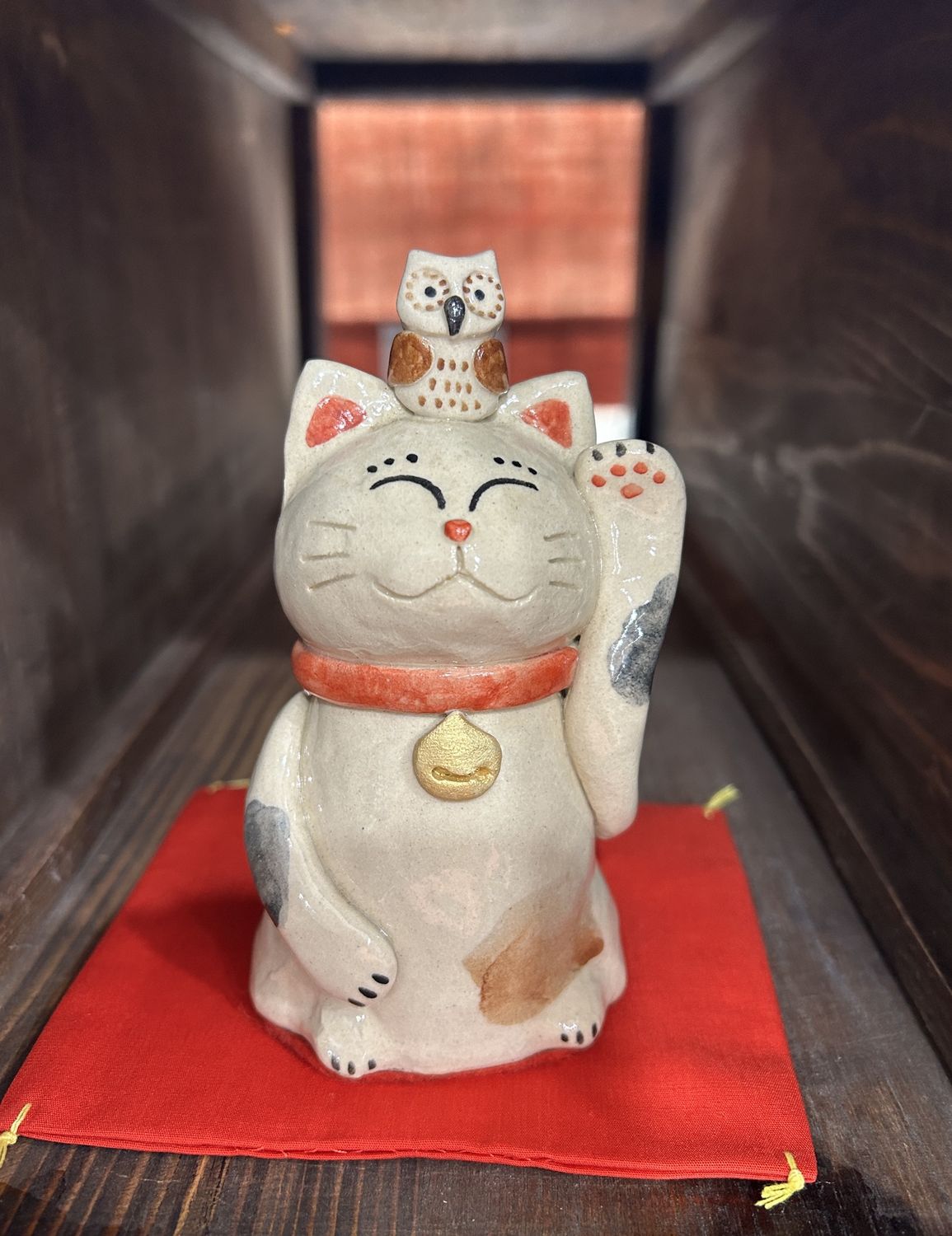 Handcrafted Ceramic Maneki-neko (Lucky Cat) with Owl on Red Cushion