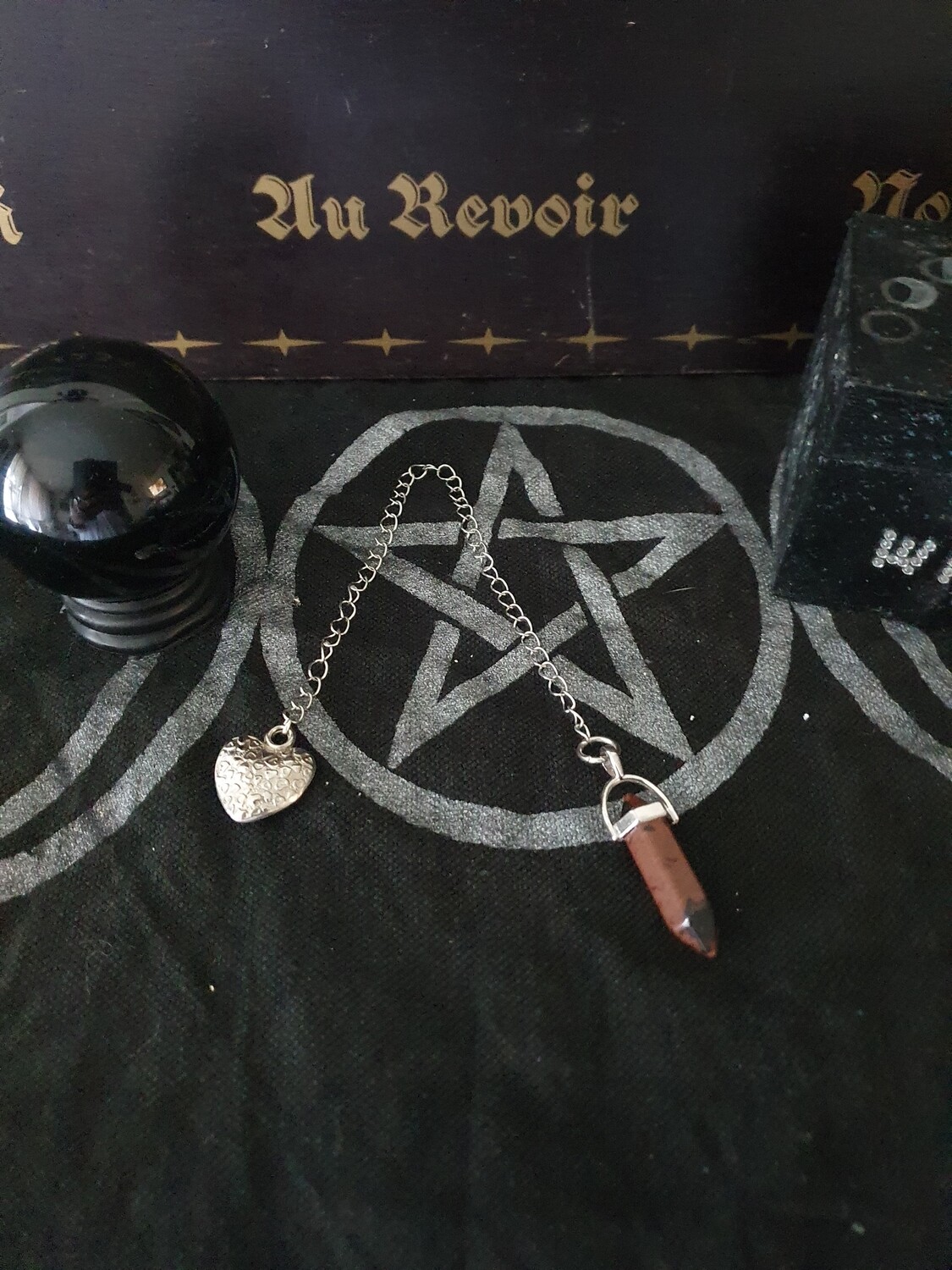 pendule en obsidienne acajou