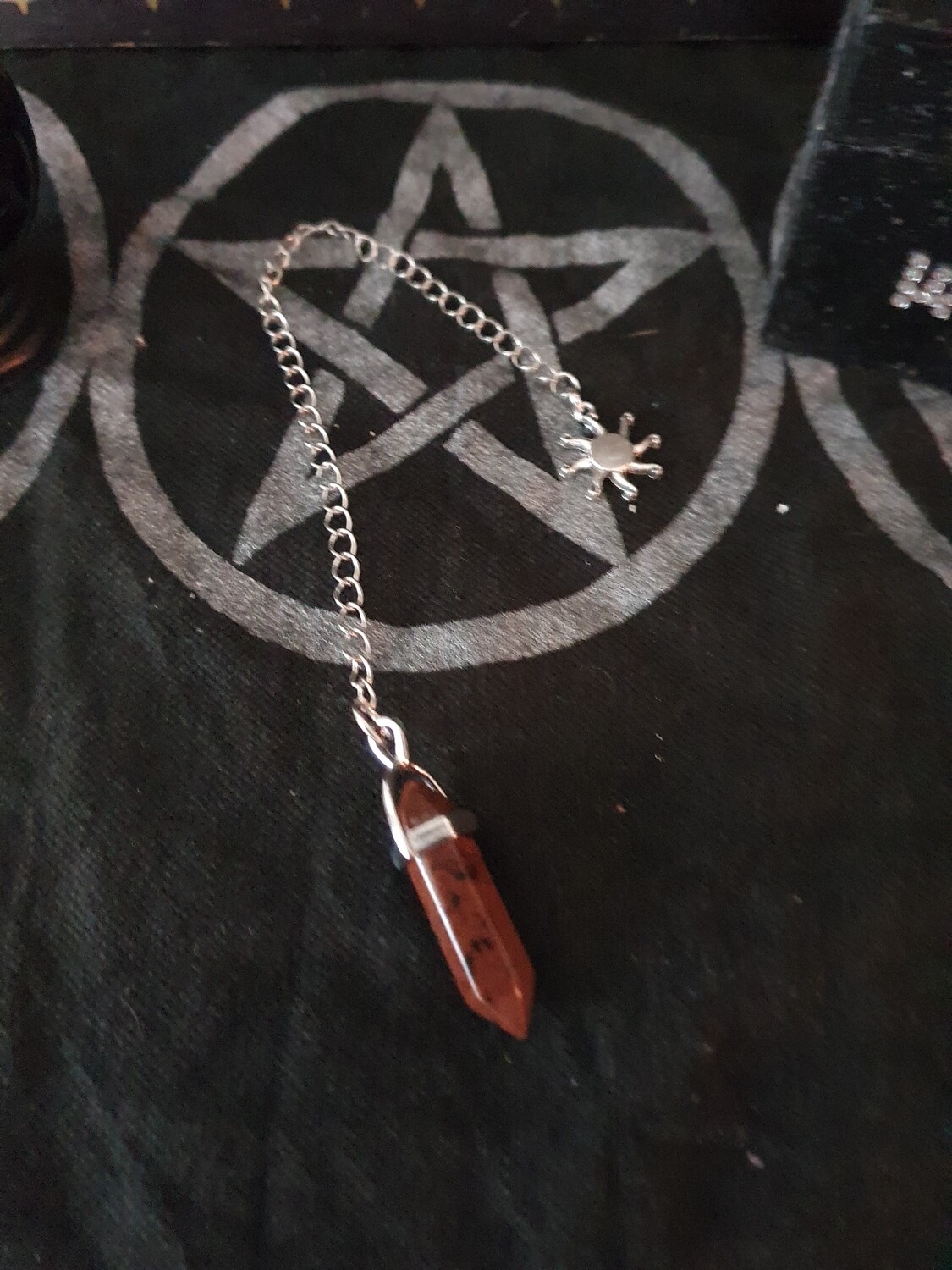 pendule en obsidienne acajou