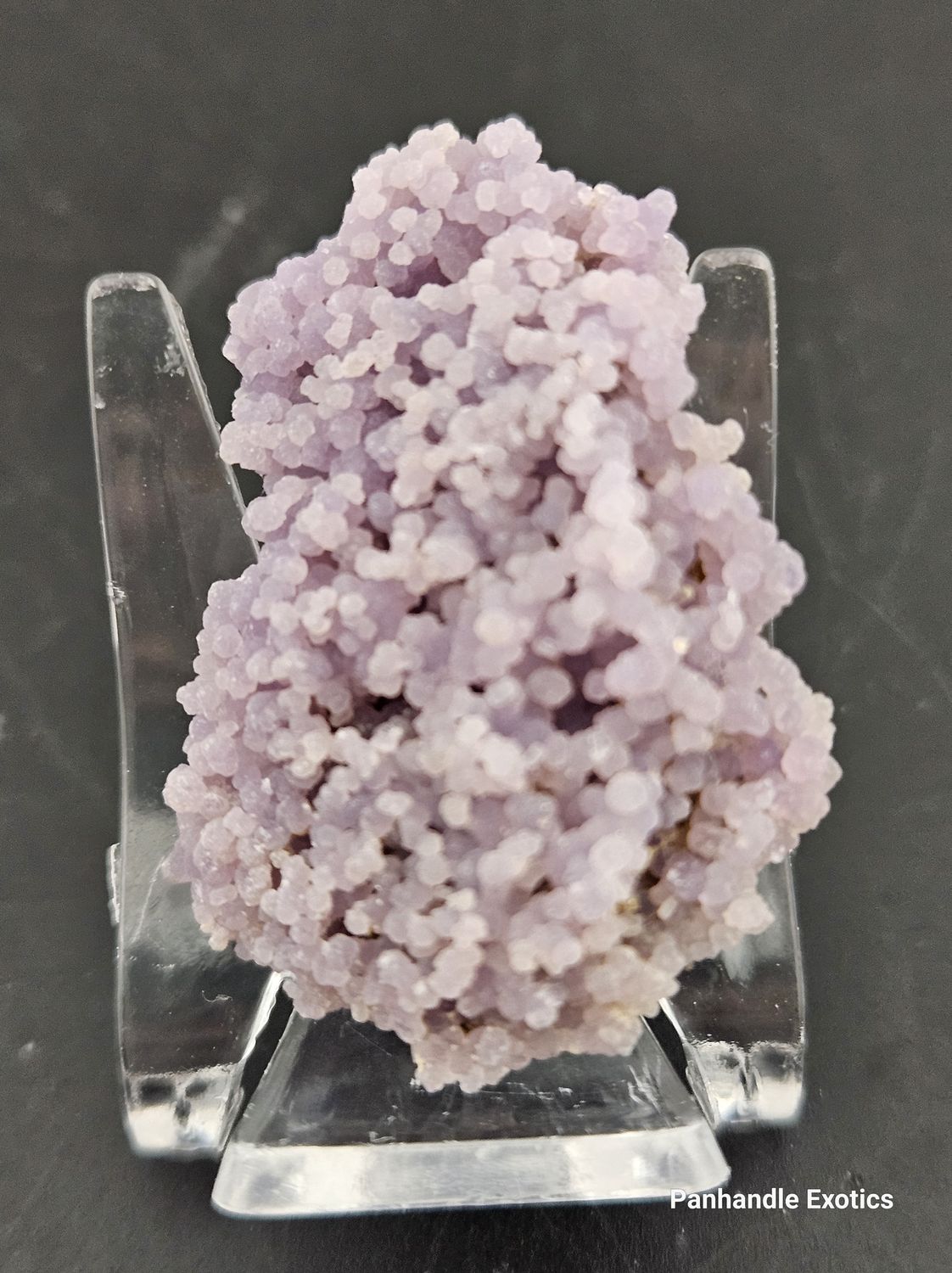 Grape Agate, small pieces on display base.