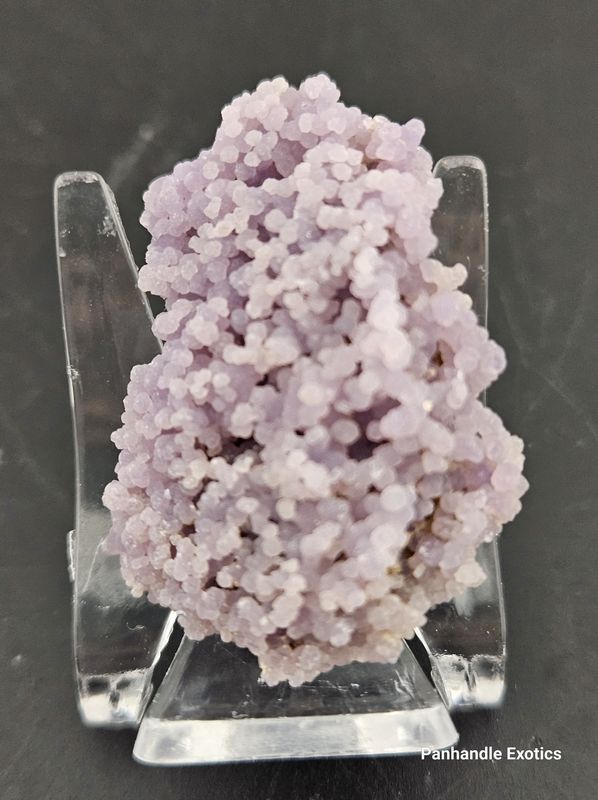 Grape Agate, small pieces on display base.