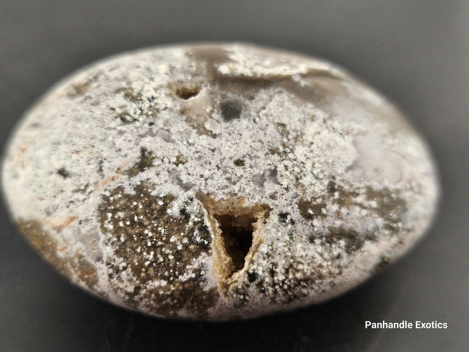 Beautiful, polished, &quot;hand stone.&quot; Has small geode!