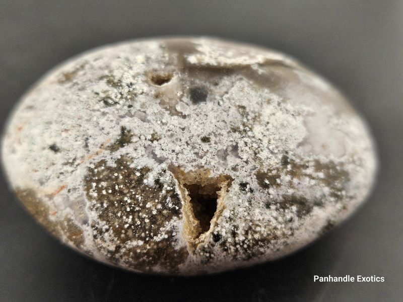 Beautiful, polished, &quot;hand stone.&quot; Has small geode!