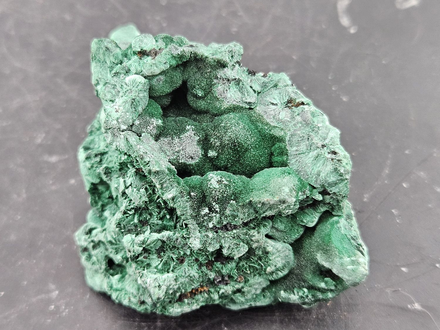 Malachite.  Beautiful piece!