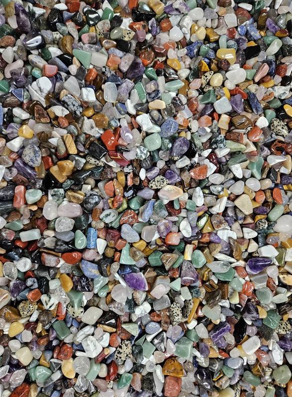 Bag of polished rocks and minerals.