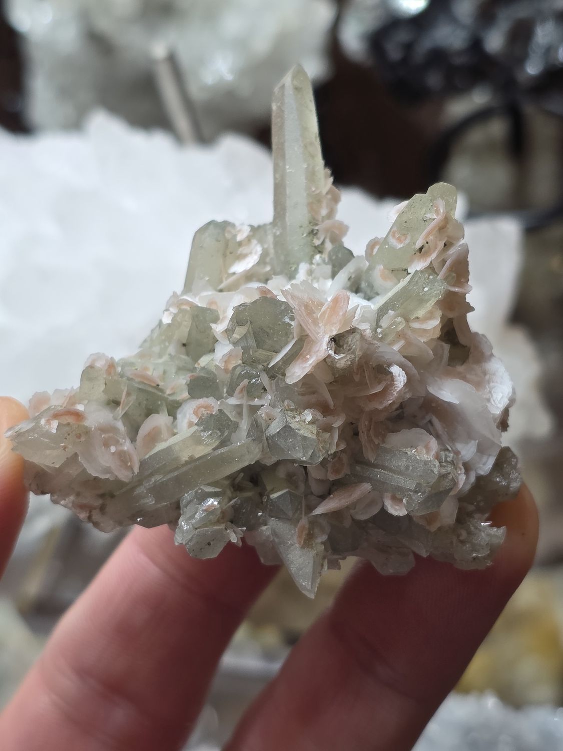 Fluorescent Calcite w/Hematite on Quartz