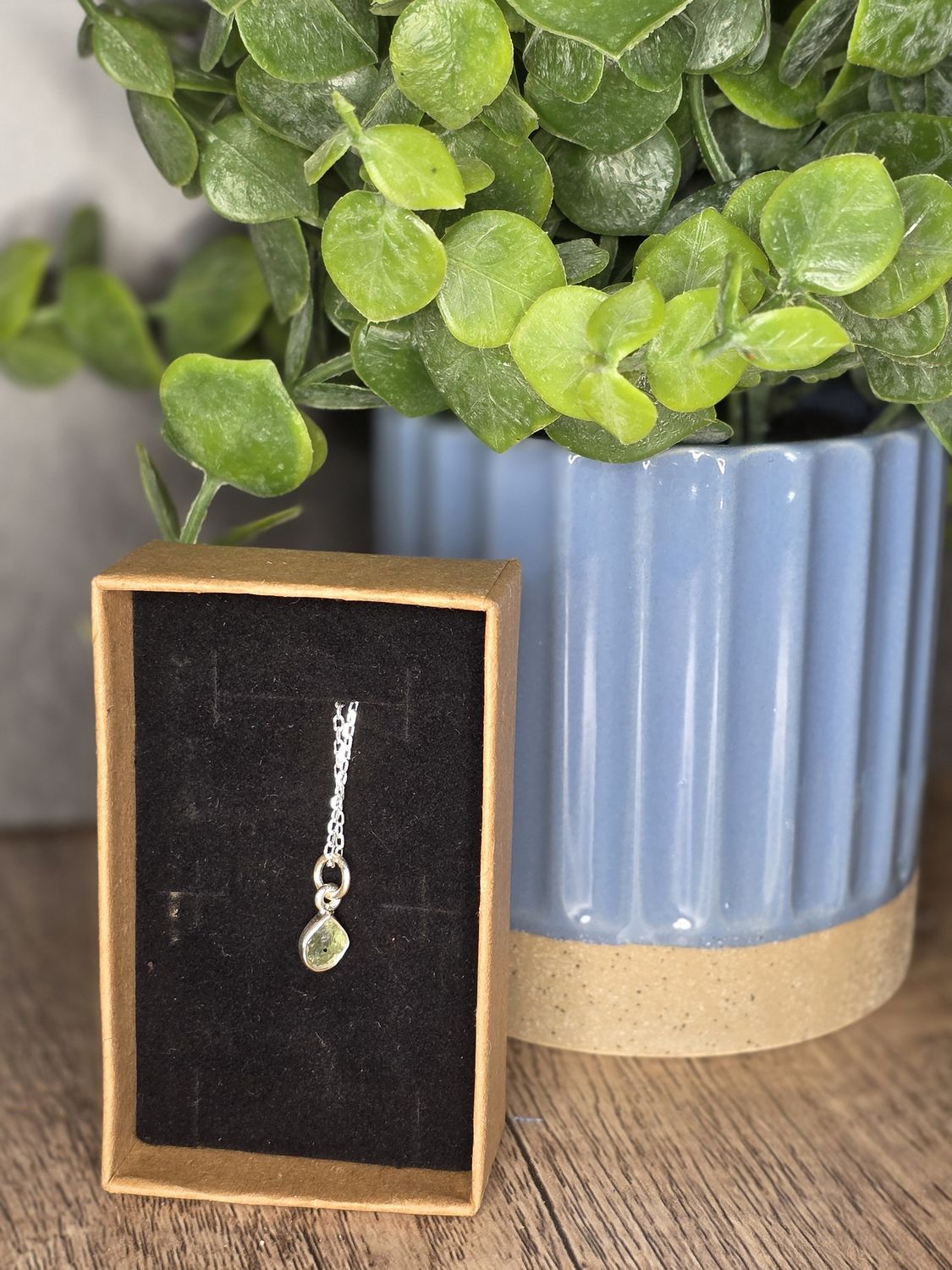 Moldavite (small), w/silver chain.