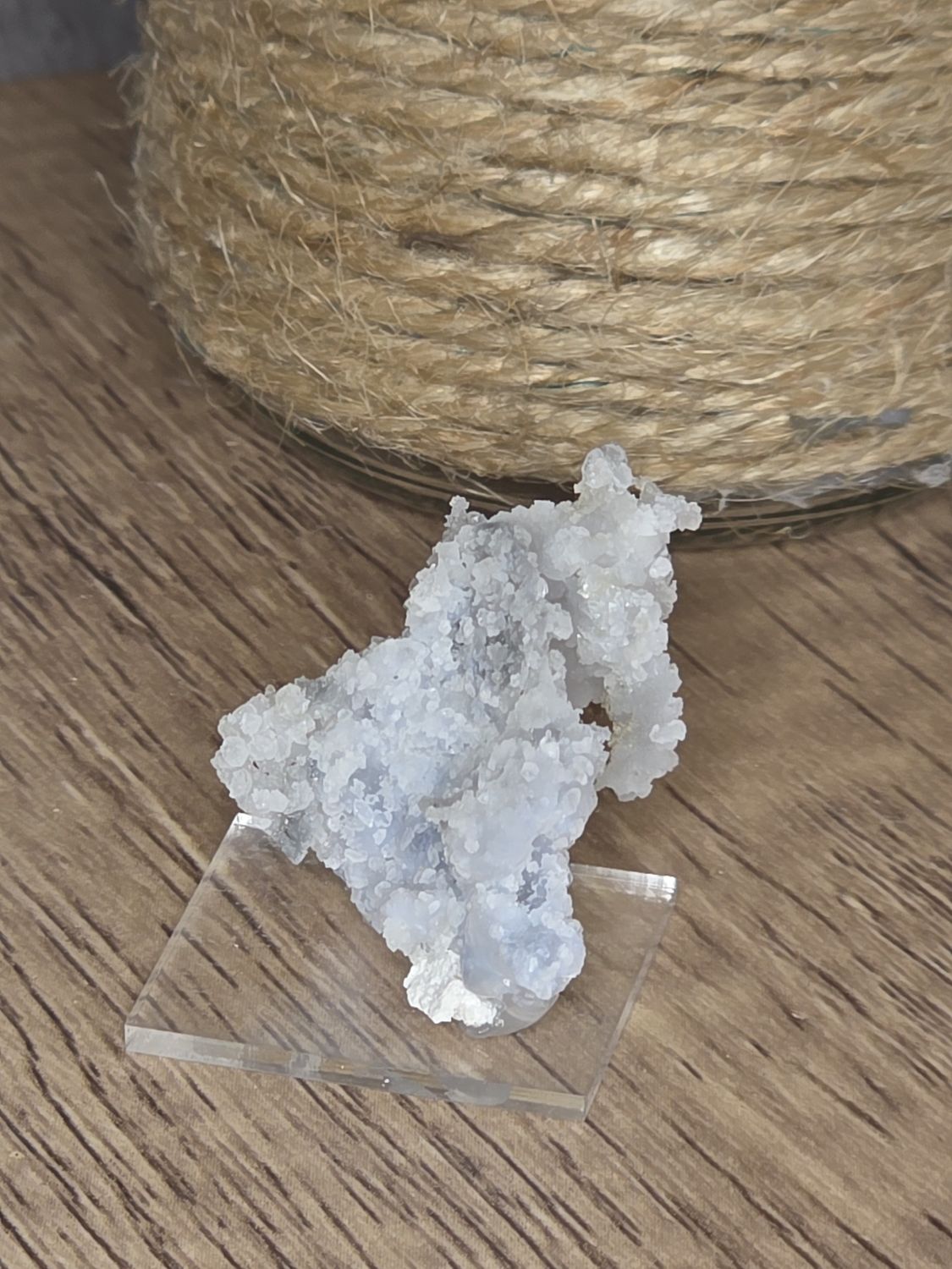 Chalcedony on glass stand