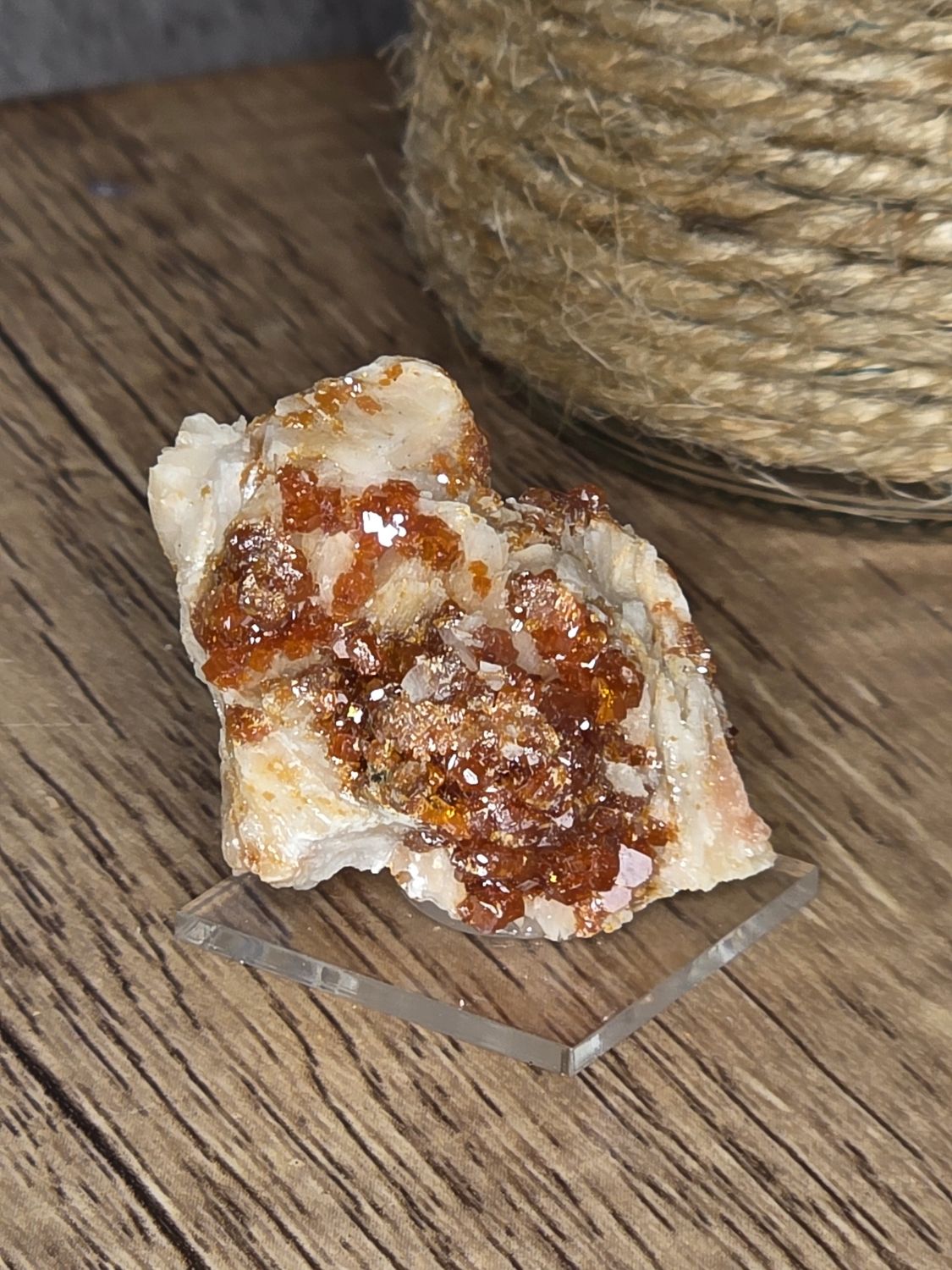 Vanadinite on glass stand