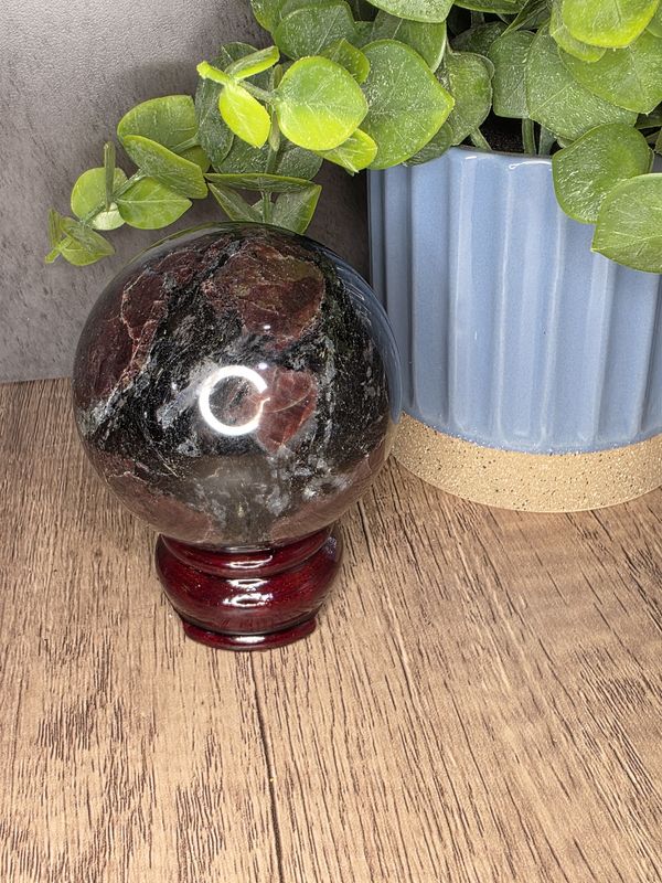 Garnet sphere w/wooden stand