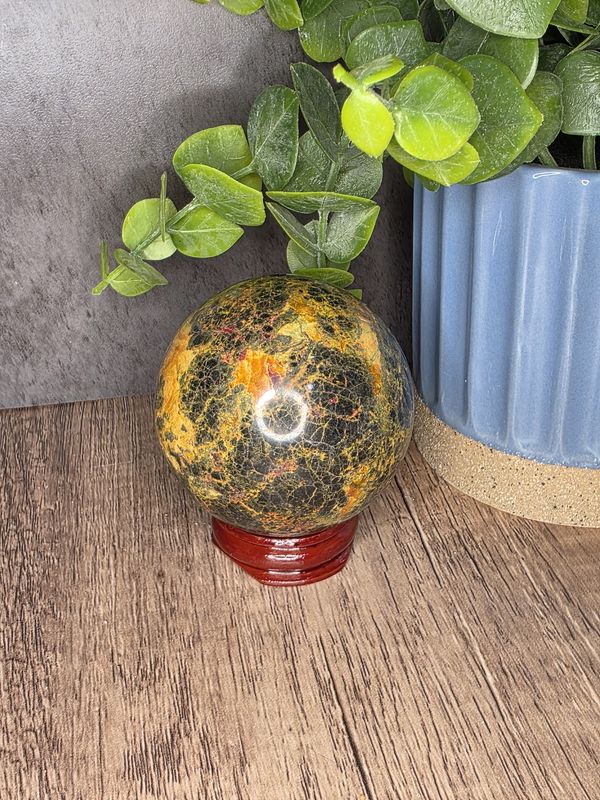 Realgar sphere w/wooden stand