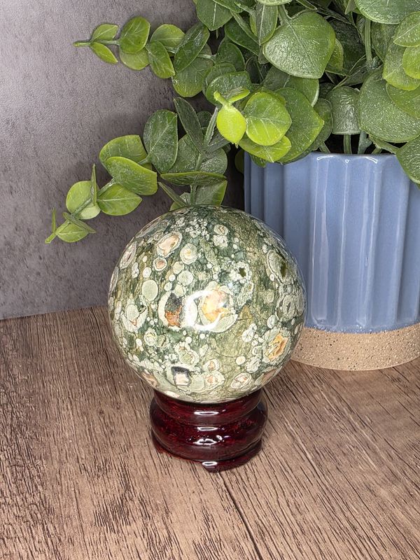 Ocean Jasper sphere w/wooden stand