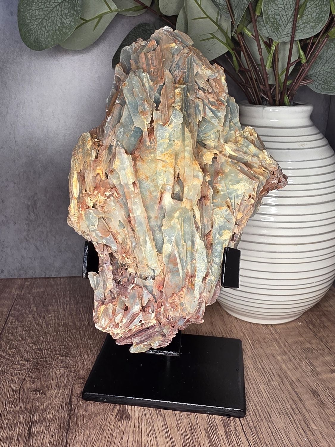 Amazonite on custom metal stand.
