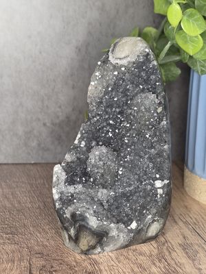 Black Amethyst w/stalactites.  Freestanding cut base.