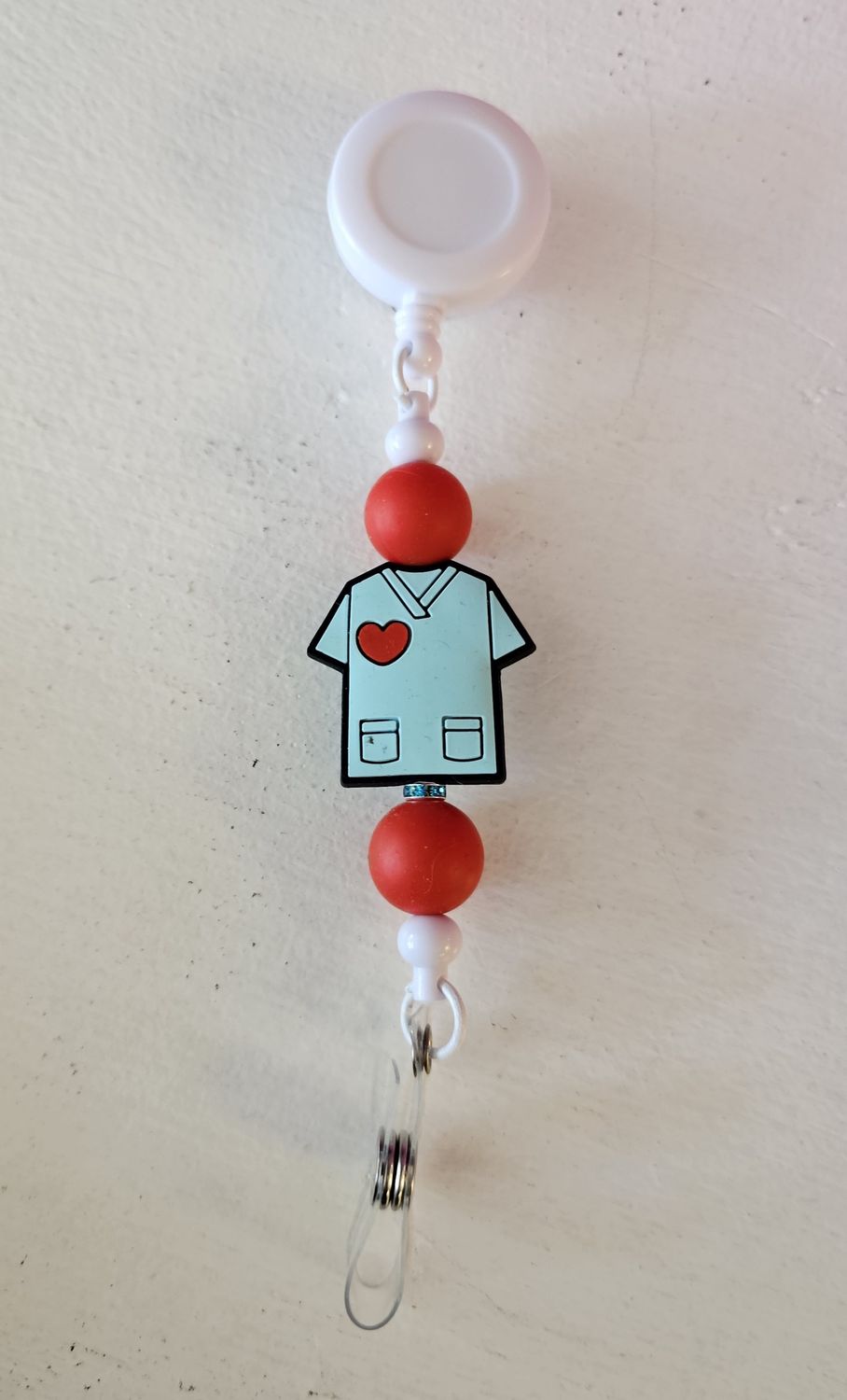 Silicone Bead Retractable Badge Reels, Colour: Blue /Red Scrub Top