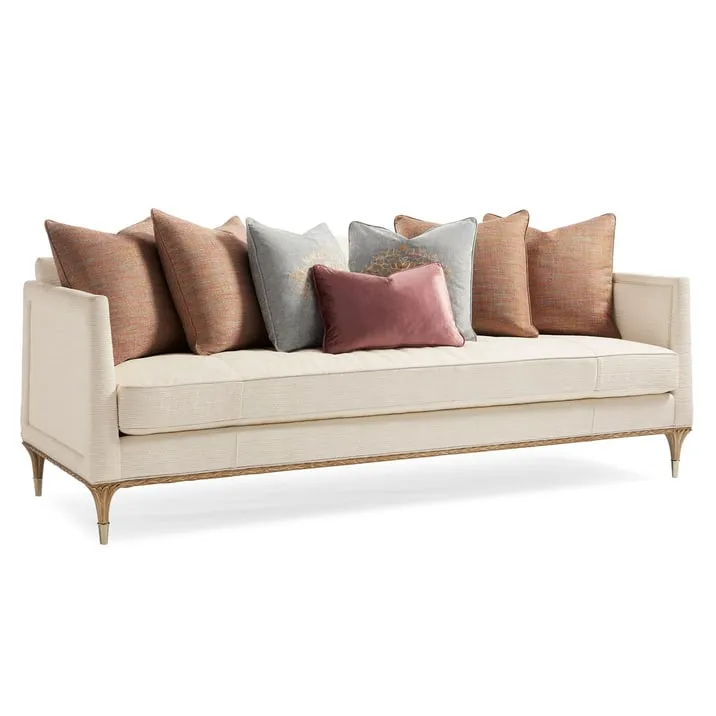 Elegant Beige and Gold Sofa with Multiple Pillows