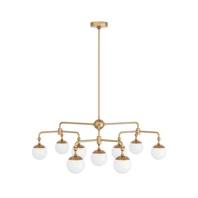 Brass chandelier with white globe shades