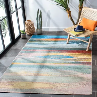 Modern colorful rectangular abstract area rug in sunroom