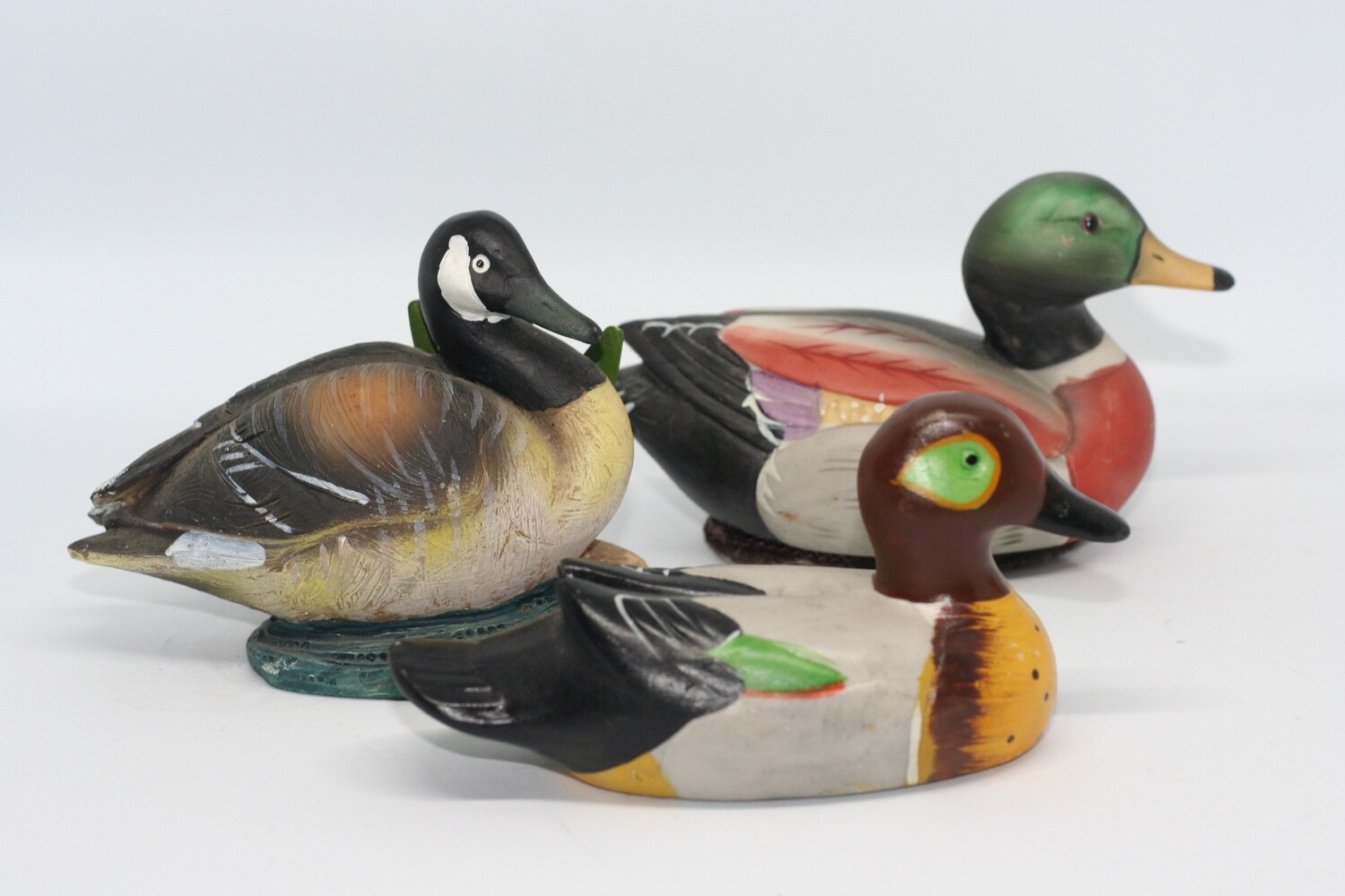 Vibrant Trio: Colorful Duck Collection