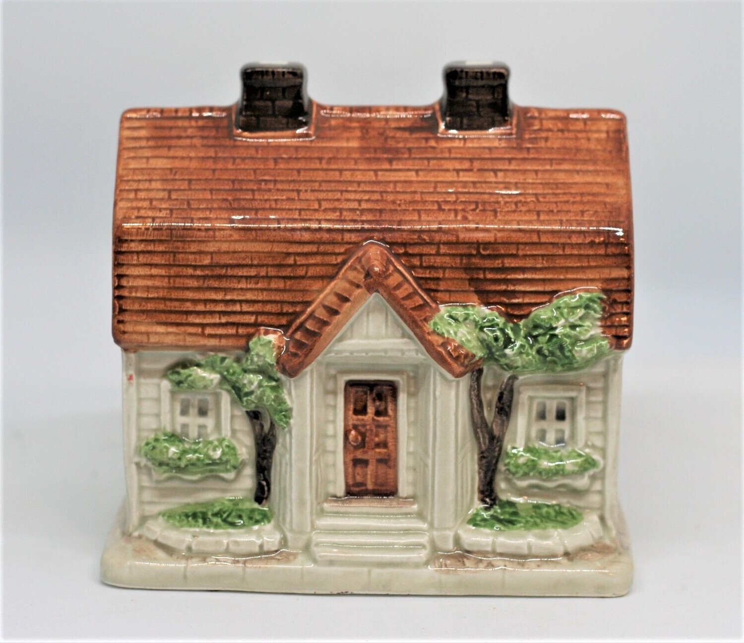 Save in Style with Josef Originals Cottage Coin Bank