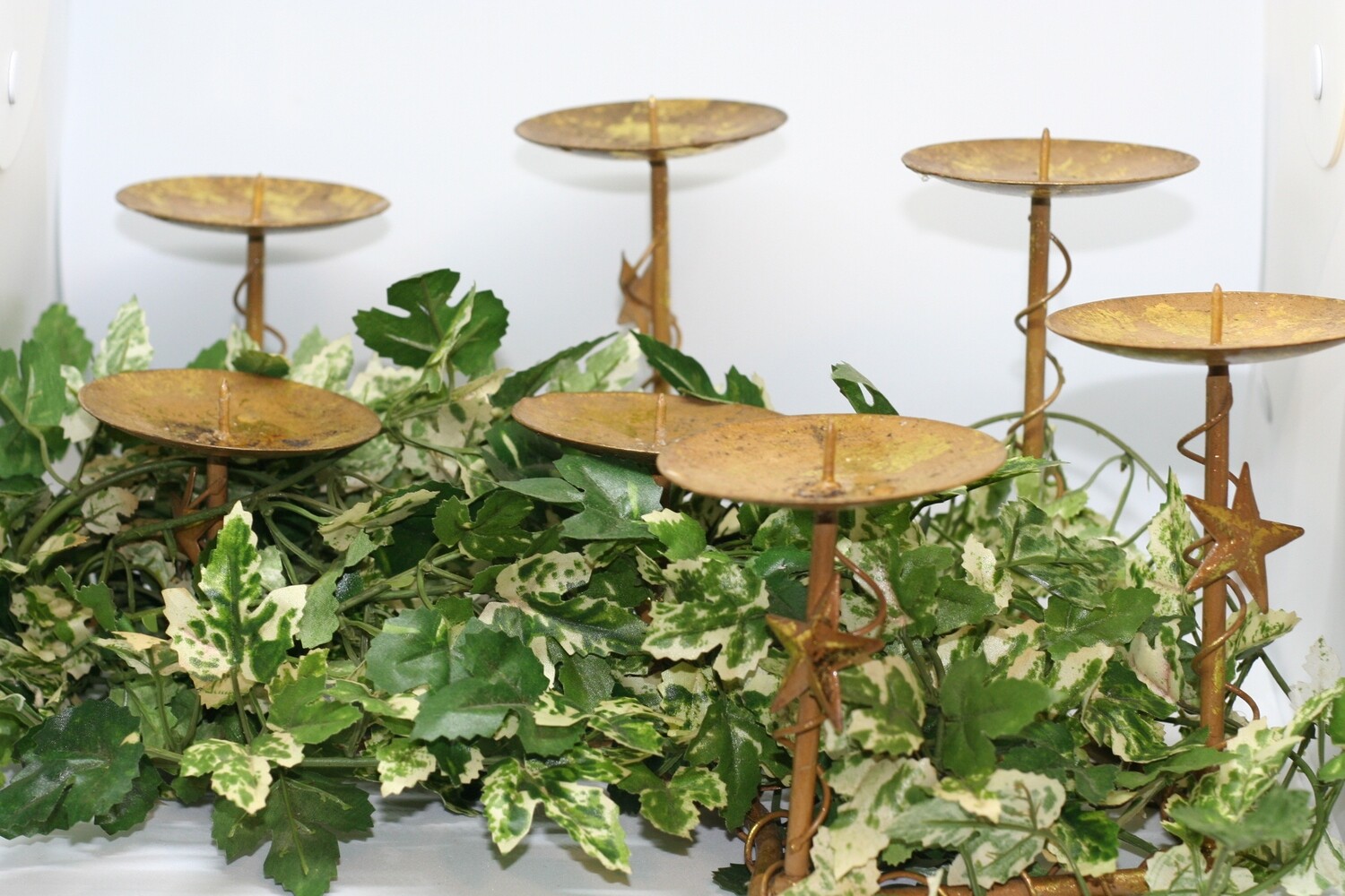 Light Up Your Home with Our Rustic Star Candle Holders!