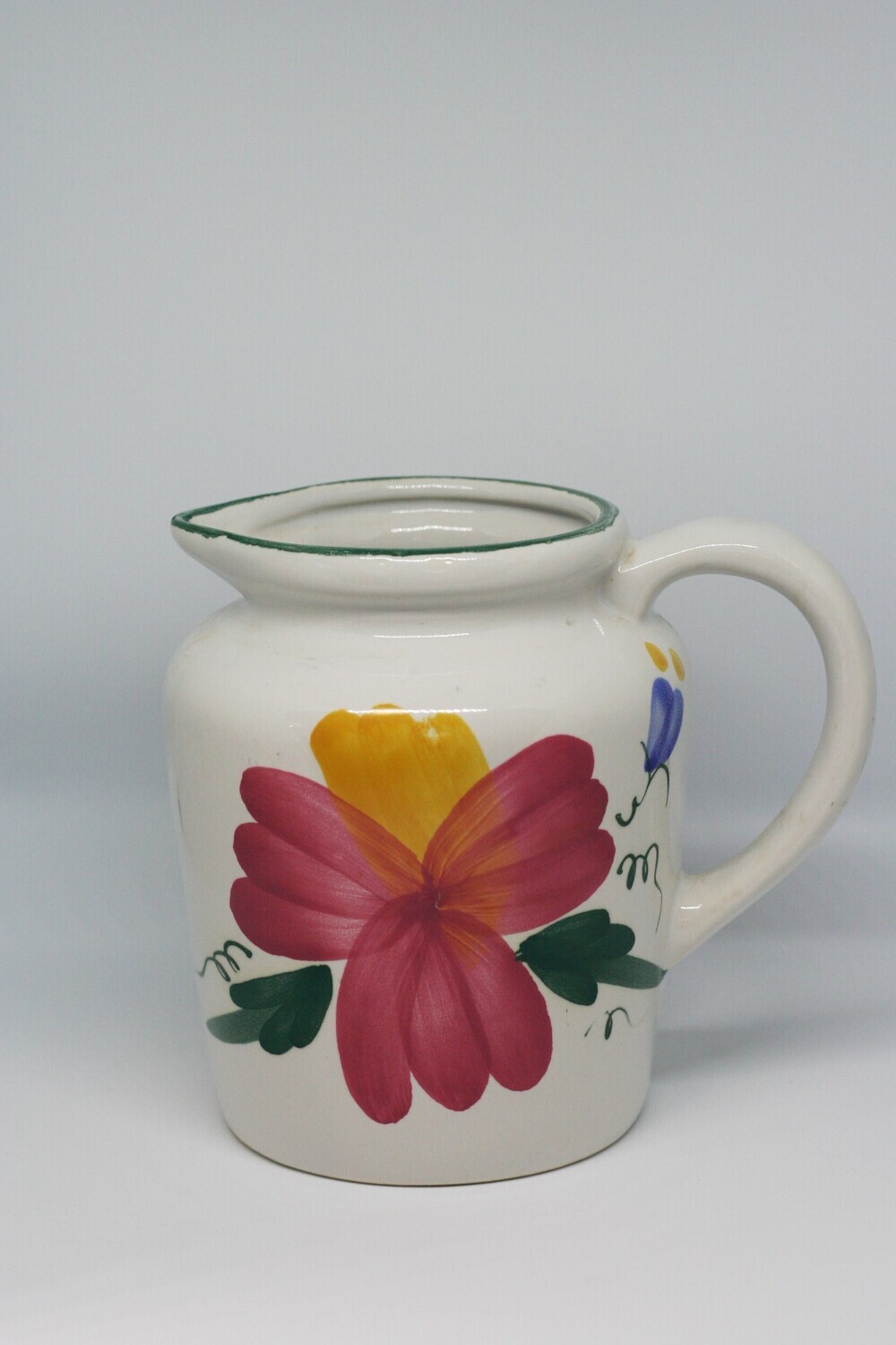 Southern Charm: Delightful White Flower Pitcher