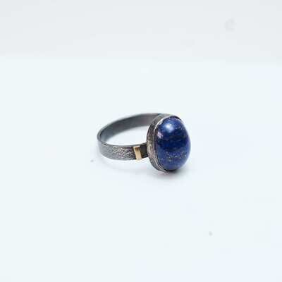 Lapiz Lazuli Cabochon Set In Silver With Gold Detail