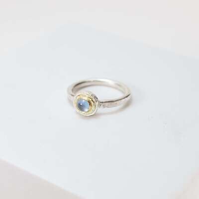 Blue Topaz Silver Ring With 18K Gold Setting
