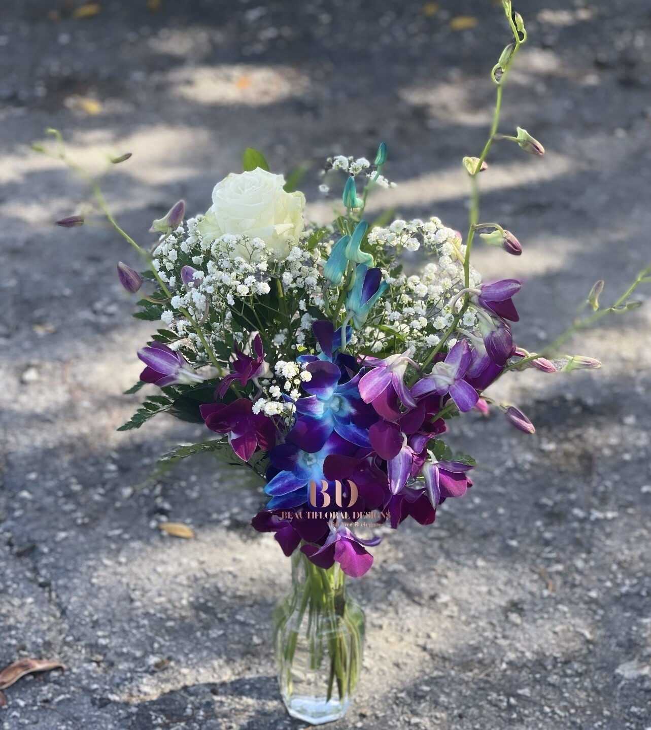 Orchids &amp; rose arrangement